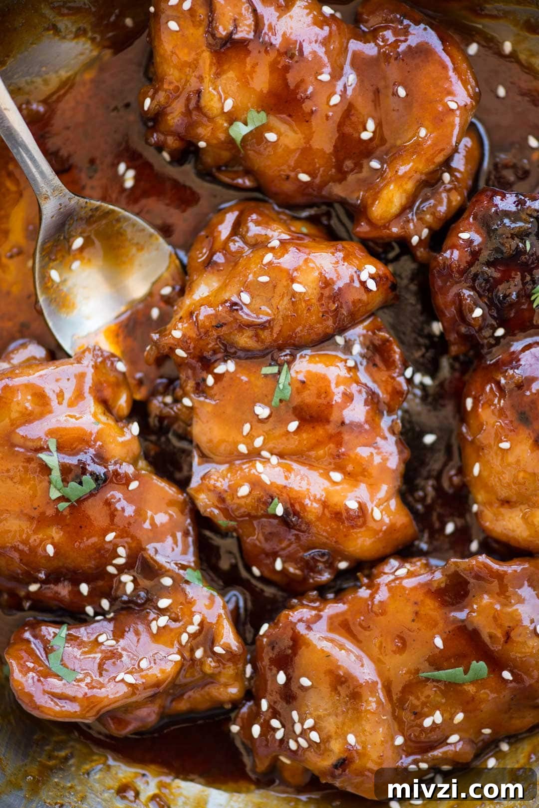 Honey Sriracha Chicken has Juicy chicken thighs in an incredibly delicious sticky, sweet and spicy Honey Sriracha sauce. You need less than 20 minutes to make this recipe with basic pantry ingredients.  