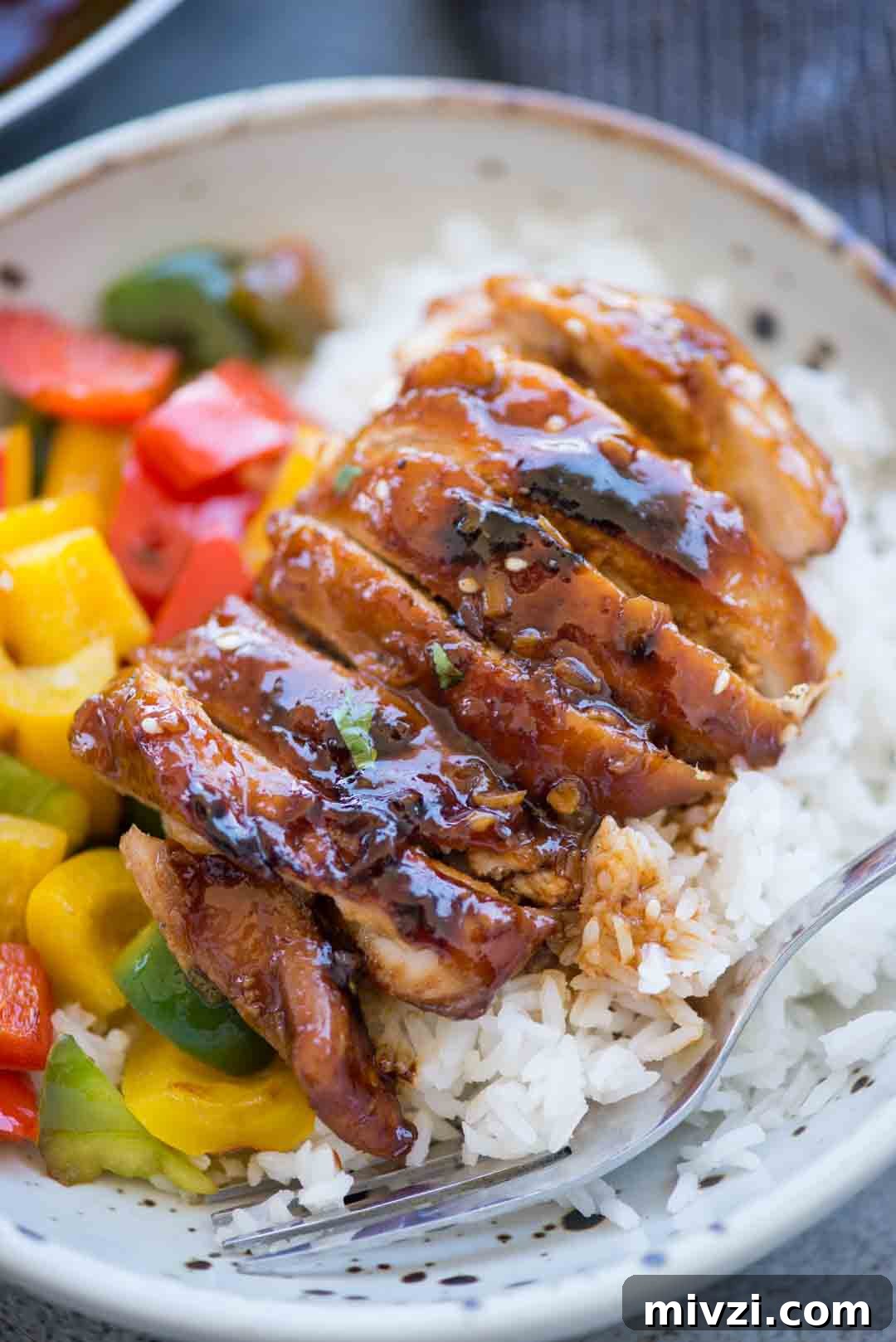 Honey Sriracha Chicken has Juicy chicken thighs in an incredibly delicious sticky, sweet and spicy Honey Sriracha sauce. You need less than 20 minutes to make this recipe with basic pantry ingredients.  