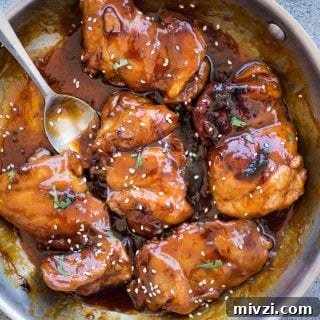 Sweet and spicy Honey Sriracha Chicken made in a skillet