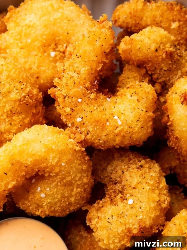 Crispy Panko Shrimp Tacos with Tangy Slaw 8 Fried crispy shrimp is coated in an easy bread crumb exterior that's crunchy and served with sauce