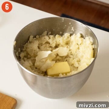Garlic Parmesan Mashed Potatoes Recipe — Creamy Comfort Side Dish 9 Mashed potatoes combined with mascarpone and butter.