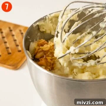 Garlic Parmesan Mashed Potatoes Recipe — Creamy Comfort Side Dish 10 Garlic confit combined with mashed potatoes.