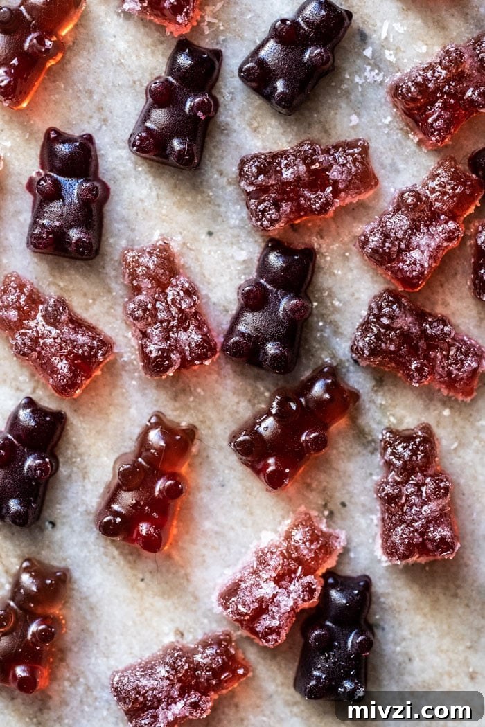 Keto CBD Gummies: Gluten-Free, Paleo-Friendly Relief 5 Overhead shot of sour and raspberry keto gummies on marble