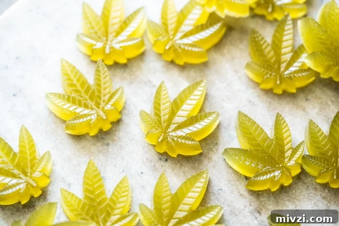 Keto CBD Gummies: Gluten-Free, Paleo-Friendly Relief 7 Green keto CBD gummies in cannabis leaf shape