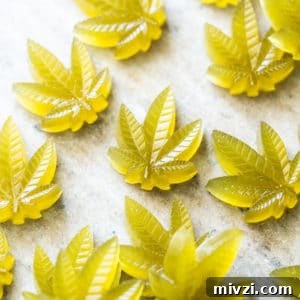 Keto CBD Gummies: Gluten-Free, Paleo-Friendly Relief 8 Green keto CBD gummies in cannabis leaf shape
