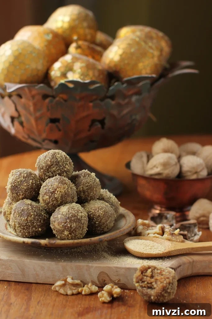 Maple Walnut Energy Bites: High-Protein Snack Recipe 2 maple walnut energy balls with gilded fruit bowl