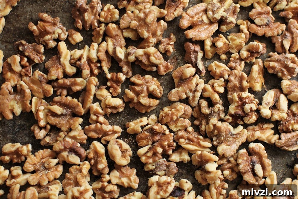 Maple Walnut Energy Bites: High-Protein Snack Recipe 5 toasted walnuts in pan