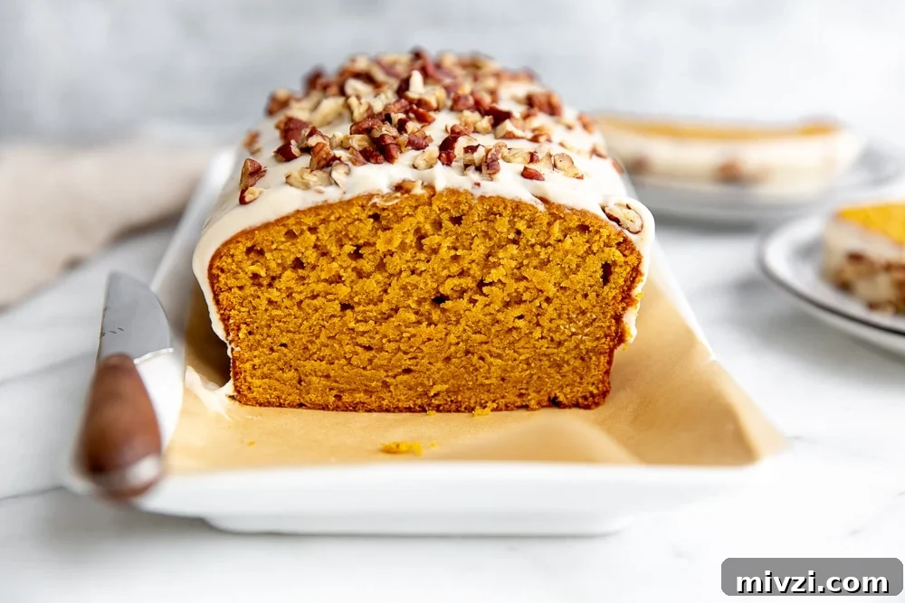 Pumpkin Pound Cake with Bourbon Cream Cheese Frosting рецепт 10 Close up of the cake on a serving platter.
