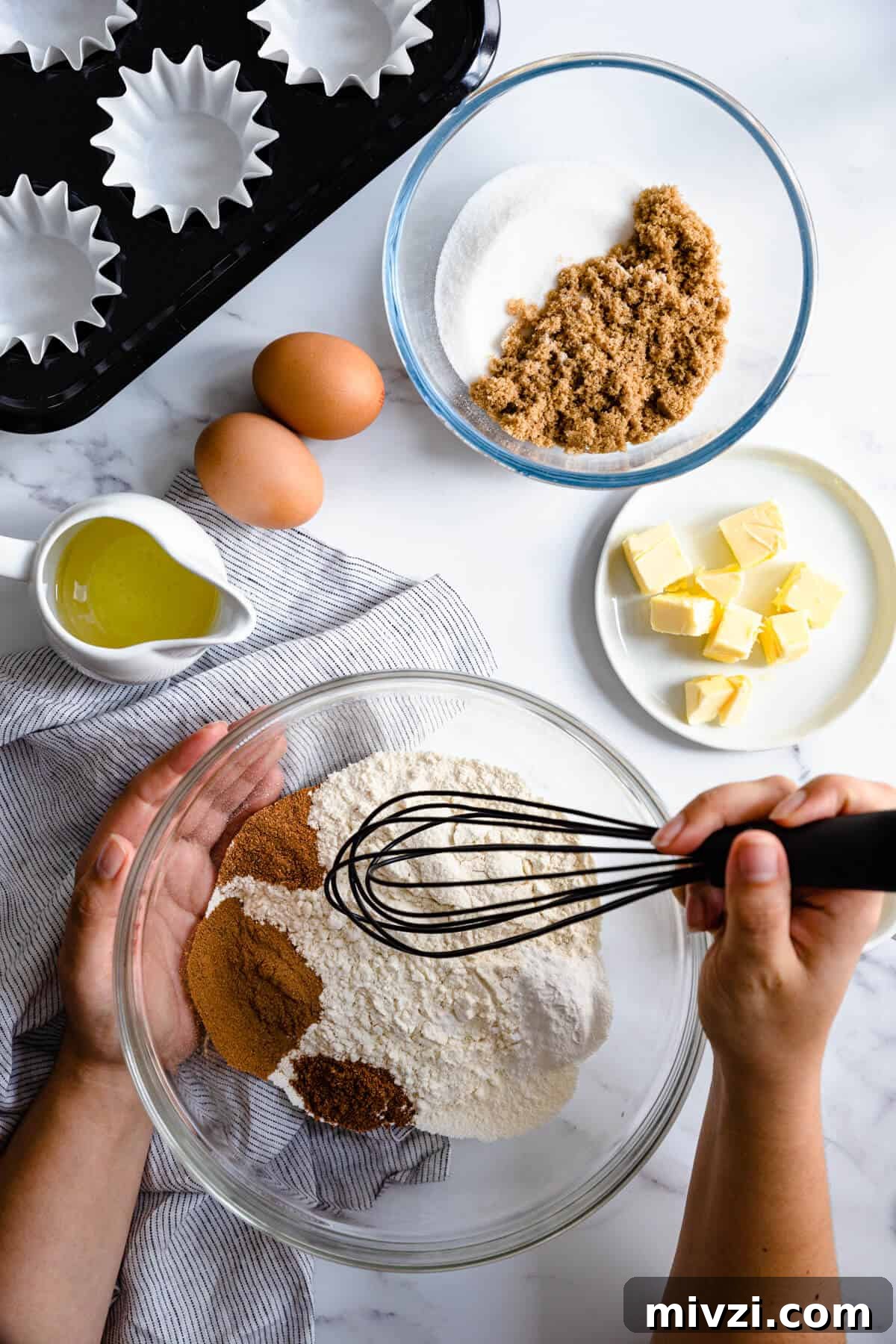 overhead shot of a person mixing some ingredients in a bowl