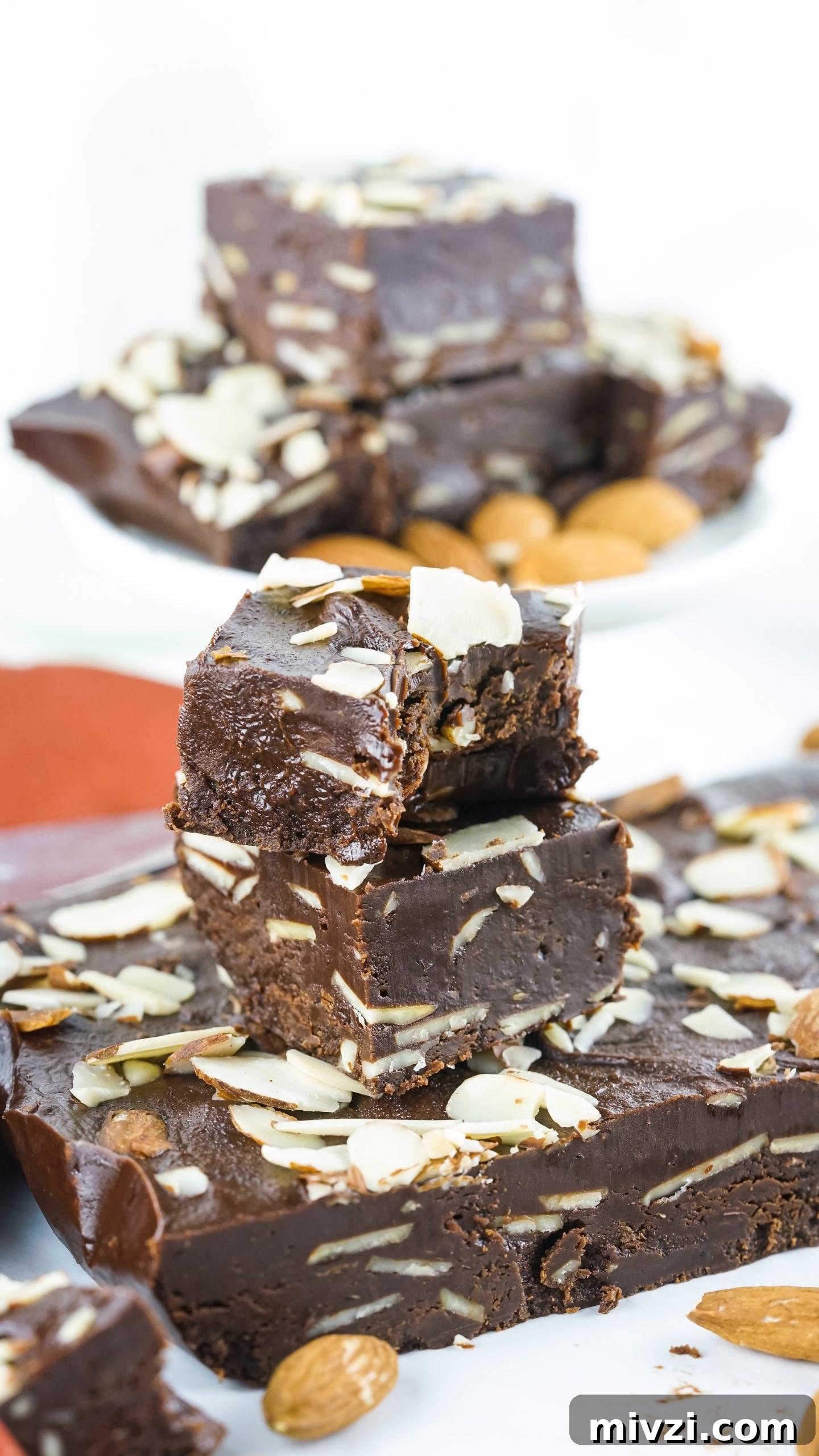 Microwave Chocolate Almond Fudge Recipe: Quick & Rich Treat 6 Stacks of chocolate almond fudge.