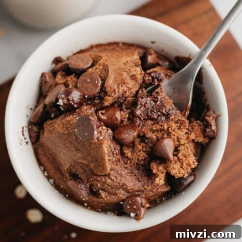 Chocolate baked oats in a small white dish.