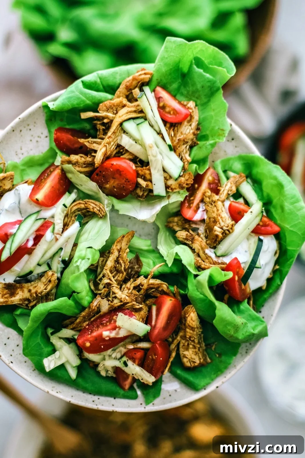 Instant Pot Chicken Shawarma Lettuce Cups | Killing Thyme Instant Pot Chicken Shawarma Lettuce Cups on a plate