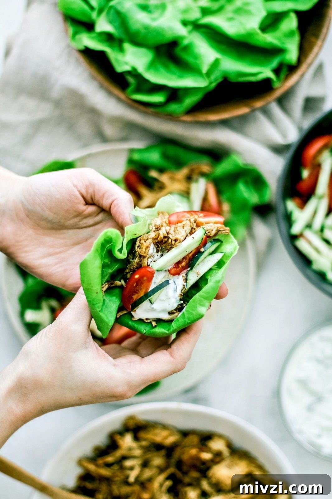 Instant Pot Chicken Shawarma Lettuce Cups | Killing Thyme Instant Pot Chicken Shawarma Lettuce Cups in hand