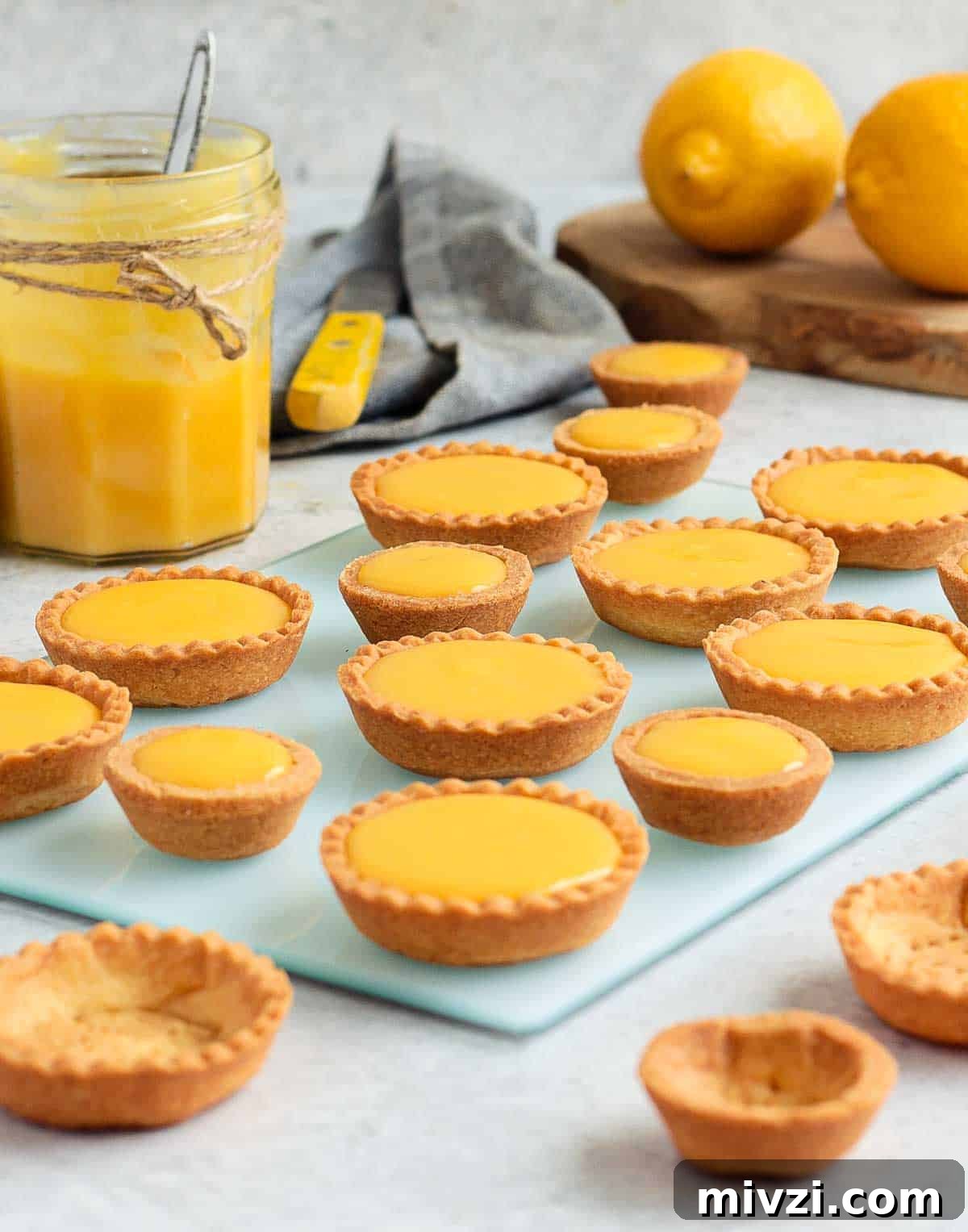 Mini Tarts on a light blue plate.