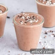 18 Creamy Smoothies Without Banana: Delicious Dairy-Free Recipes 2 Three chocolate smoothies on a table.