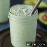 18 Creamy Smoothies Without Banana: Delicious Dairy-Free Recipes 16 Avocado shake in a glass.