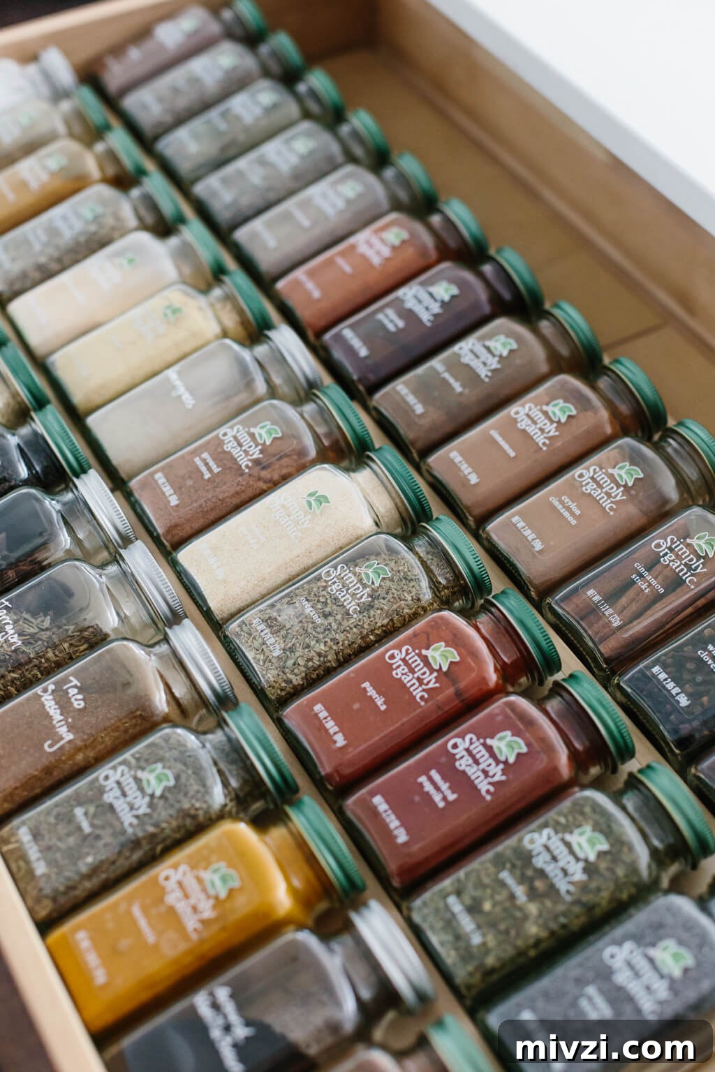 My spice drawer is pivotal to cooking healthy recipes. So today I'm sharing how I organize my spice drawer and giving you a few tips for dried spices. #SpiceOrganization #SpiceDrawer #SpiceRack #KitchenOrganization #KitchenIdeas