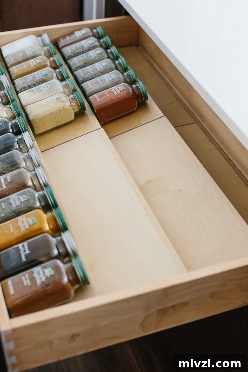 My spice drawer is pivotal to cooking healthy recipes. So today I'm sharing how I organize my spice drawer and giving you a few tips for dried spices. #SpiceOrganization #SpiceDrawer #SpiceRack #KitchenOrganization #KitchenIdeas