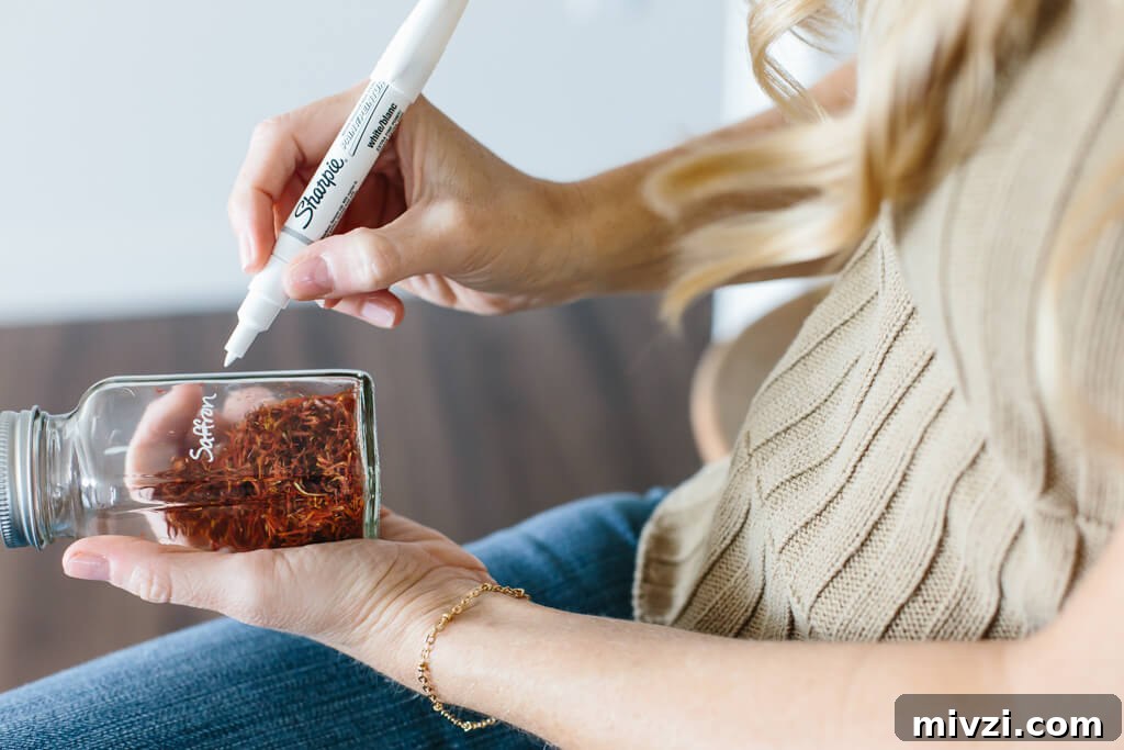My spice drawer is pivotal to cooking healthy recipes. So today I'm sharing how I organize my spice drawer and giving you a few tips for dried spices. #SpiceOrganization #SpiceDrawer #SpiceRack #KitchenOrganization #KitchenIdeas