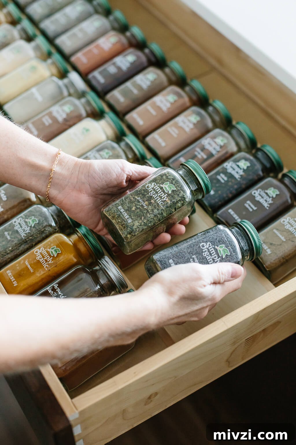 My spice drawer is pivotal to cooking healthy recipes. So today I'm sharing how I organize my spice drawer and giving you a few tips for dried spices. #SpiceOrganization #SpiceDrawer #SpiceRack #KitchenOrganization #KitchenIdeas