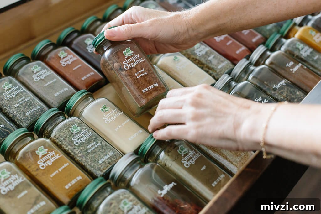 My spice drawer is pivotal to cooking healthy recipes. So today I'm sharing how I organize my spice drawer and giving you a few tips for dried spices. #SpiceOrganization #SpiceDrawer #SpiceRack #KitchenOrganization #KitchenIdeas