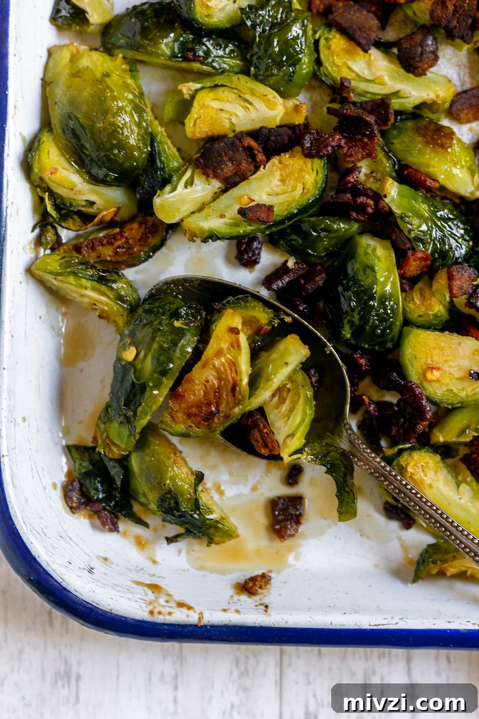 Image shows a close up of brussels sprouts with maple glaze