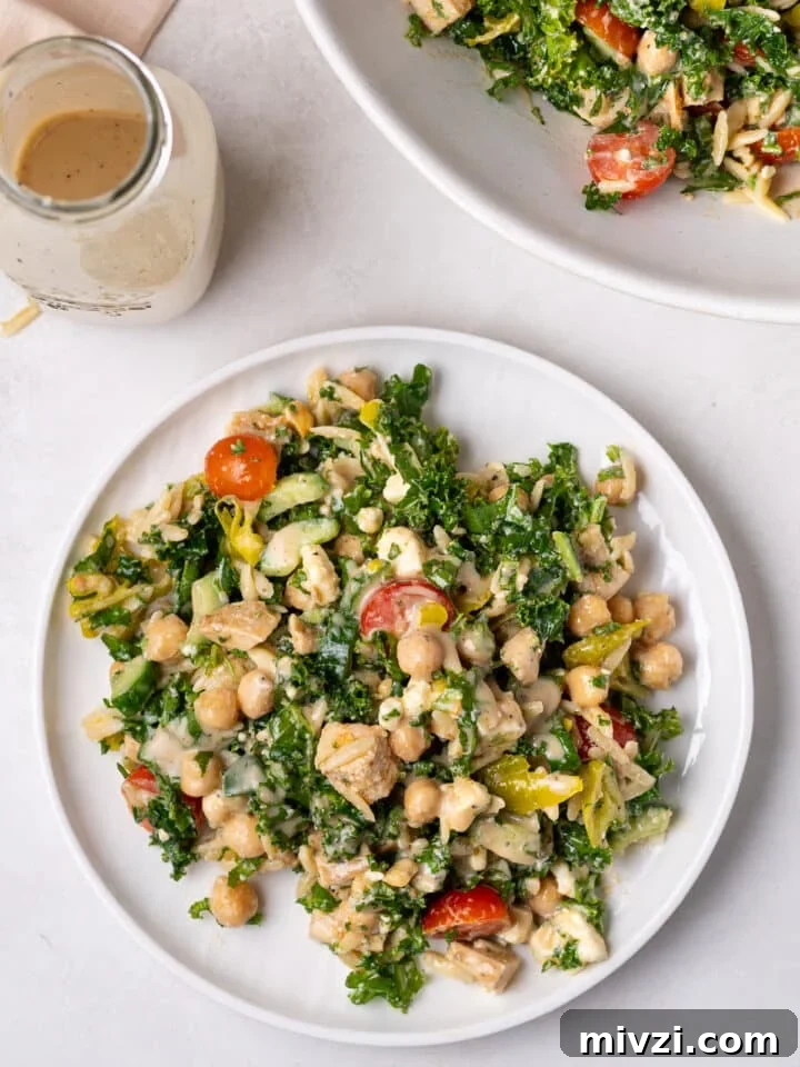 chicken and chickpea salad on a white plate