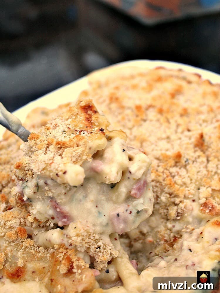 Bacon and Crab Mac n Cheese is a delicious side or main dish, with a rich creamy cheese sauce and amazing flavors from smokey bacon and crabmeat. Really tasty!