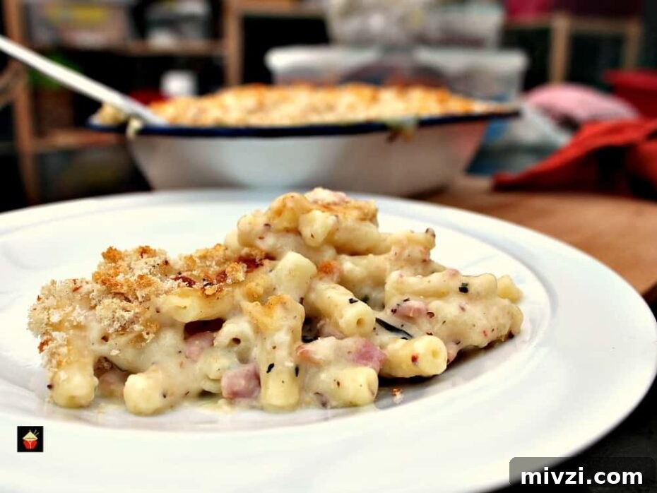 Bacon and Crab Mac n Cheese is a delicious side or main dish, with a rich creamy cheese sauce and amazing flavors from smokey bacon and crabmeat. Really tasty!