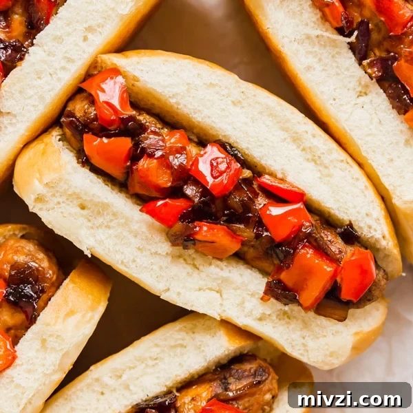 Balsamic Caramelized Onions and Peppers are the perfect addition to a spicy Italian Sausage sandwich. They're super easy to whip up with just a few ingredients!