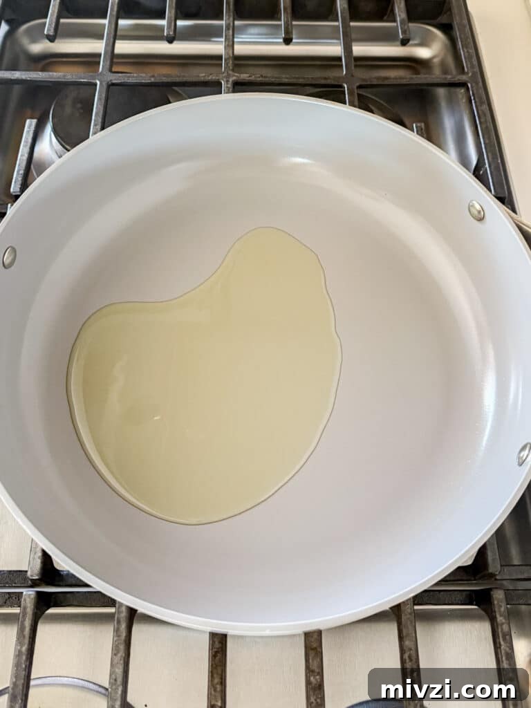 Oil heating in a pan.