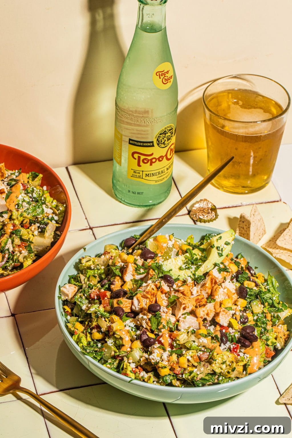 Southwest Chopped Salad Recipe with Avocado and Lime Dressing 4 two bowls of southwestern salad recipe with gold fork