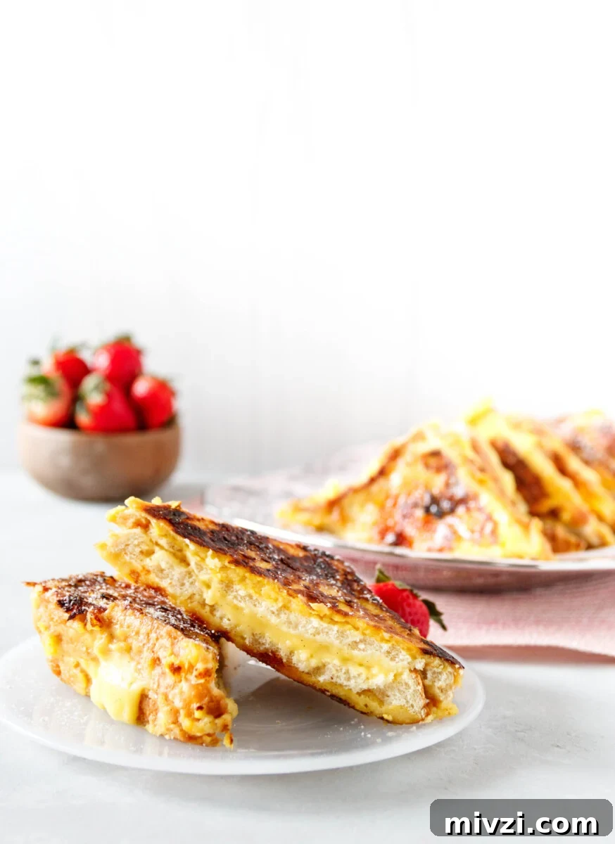 Crème Brûlée French Toast Recipe: Custardy, Caramelized Breakfast 2 sliced creme brulee french toast on a plate, ready to serve