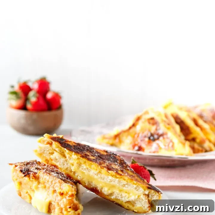 sliced creme brulee french toast on a plate, ready to serve