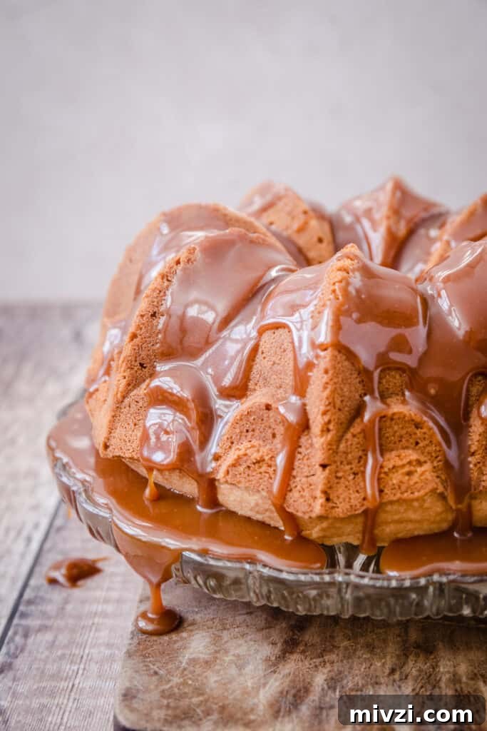 Gluten-Free Lemon Bundt Cake with Tangy Lemon Caramel 8 Lemon Caramel Cake on a glass cake stand