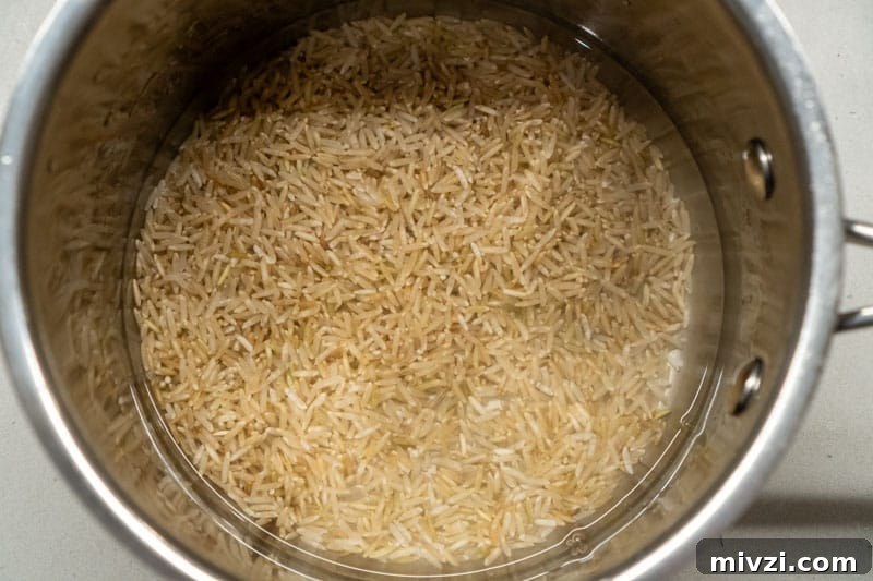 Adding the rice to a pot