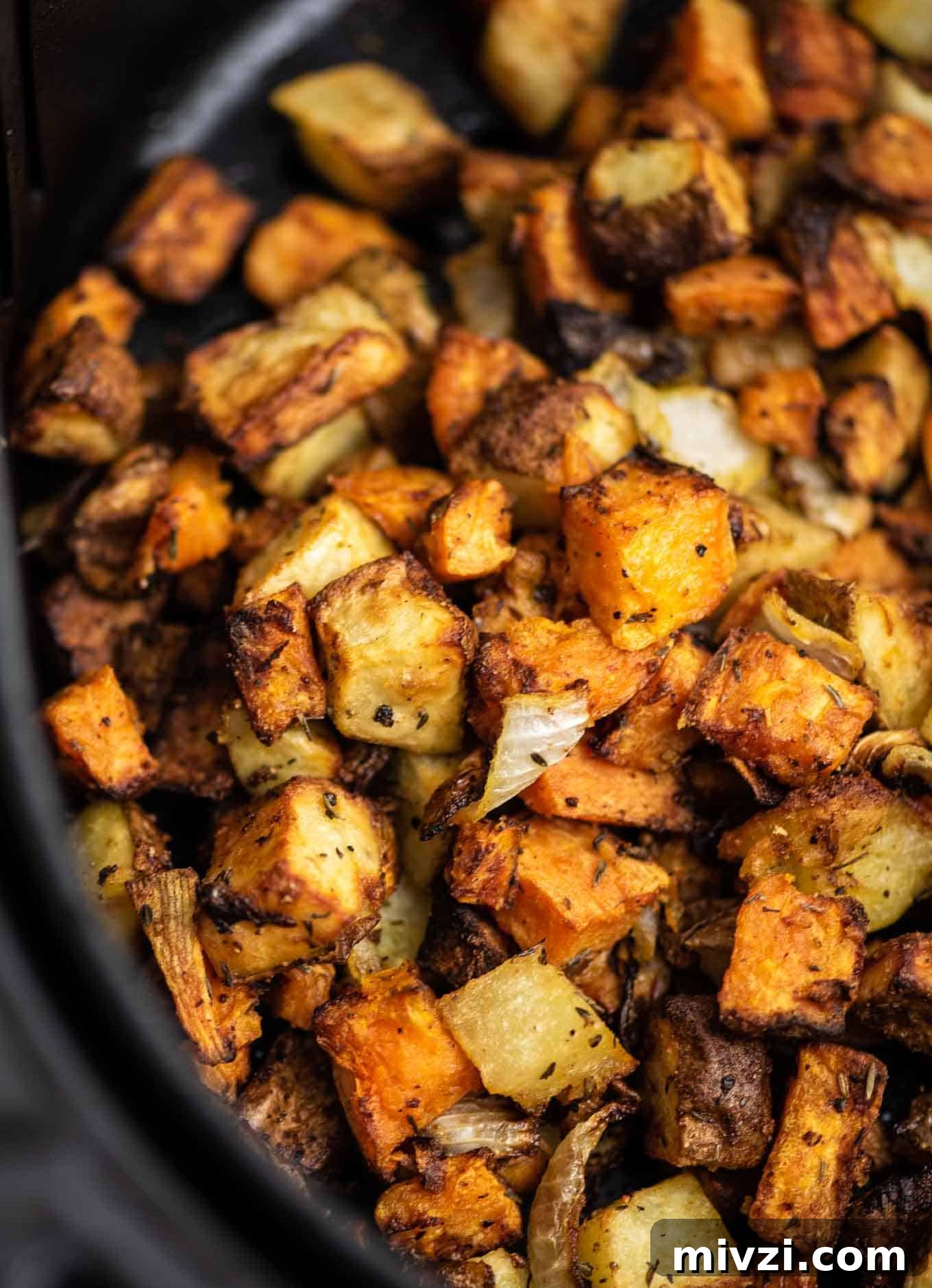 Crispy Air Fryer Breakfast Potatoes Recipe 5 breakfast potatoes in the air fryer from an overhead view