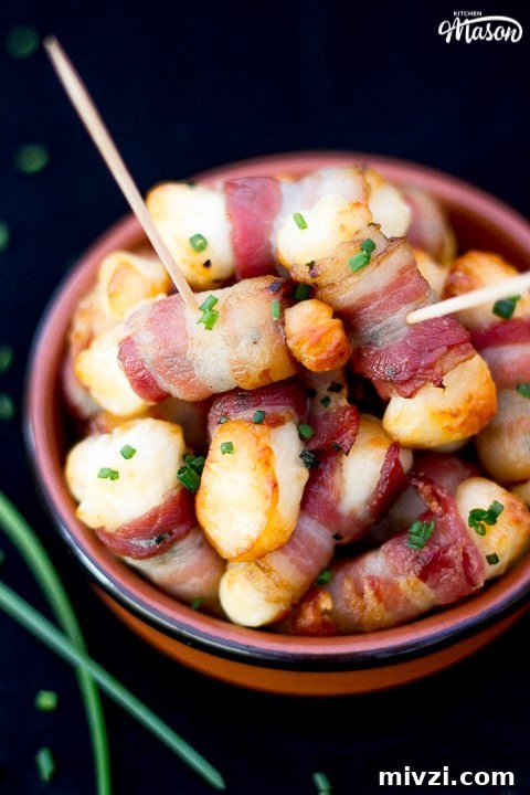 Bacon Halloumi Bites in a serving dish with cocktail sticks