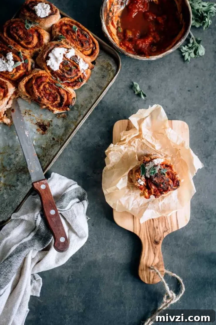 Vegan pizza rolls on a board