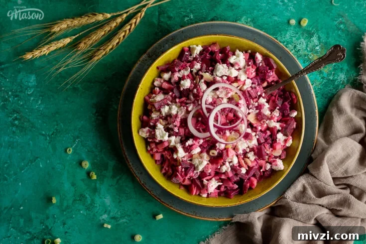 Apple and beetroot salad in a green dish