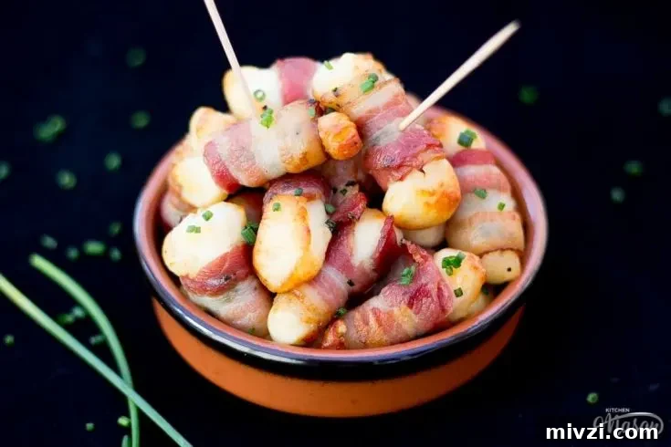 Bacon Halloumi Bites in a serving dish with cocktail sticks
