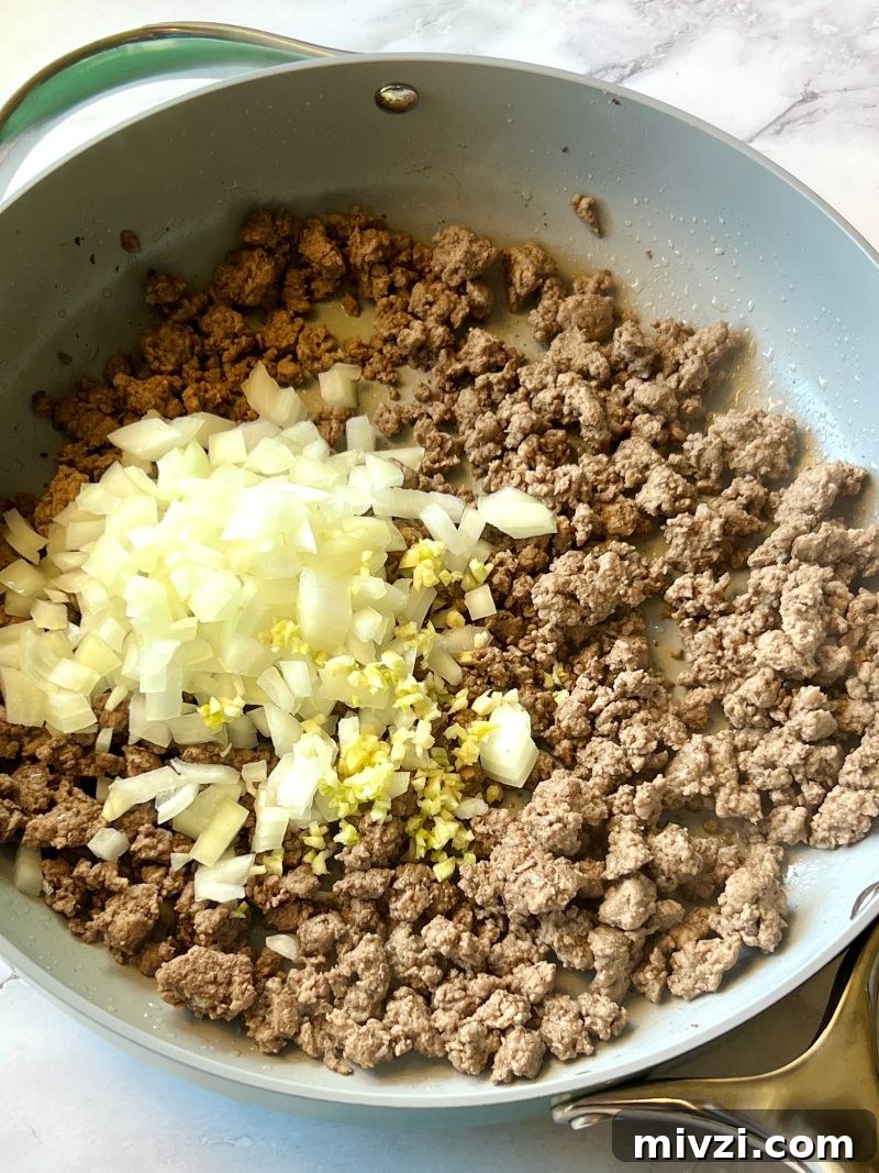 Classic Shepherd's Pie Recipe with Savory Beef and Mashed Potato Topping 4 Ground beef cooked with onions and garlic.