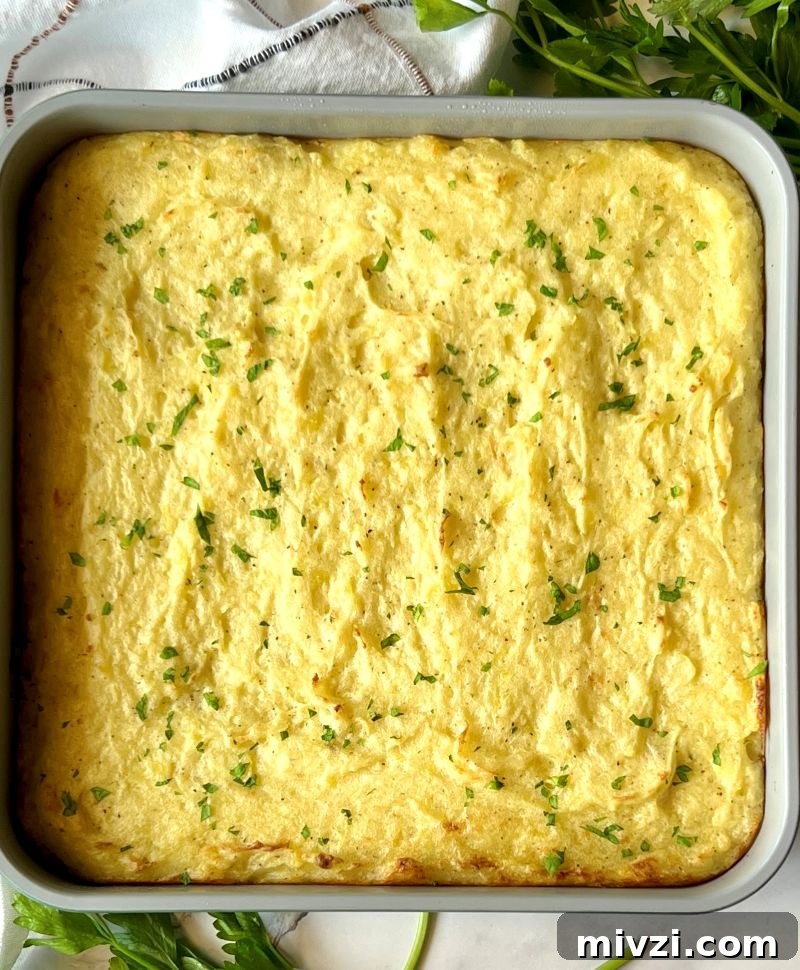 Classic Shepherd's Pie Recipe with Savory Beef and Mashed Potato Topping 9 Baked shepherd's pie golden on top.