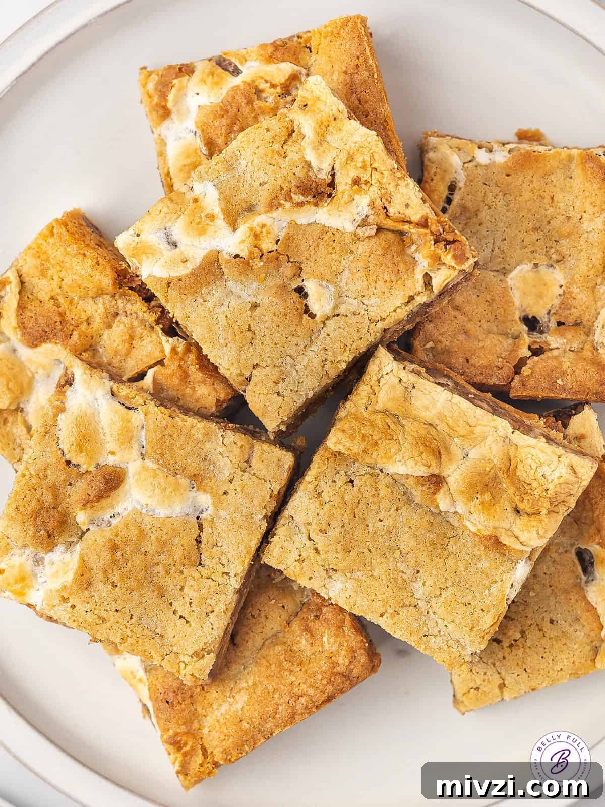 Kit Kat S'mores Bars Recipe — Crispy Chocolate Graham Squares 2 overhead pile of s'mores bars on plate