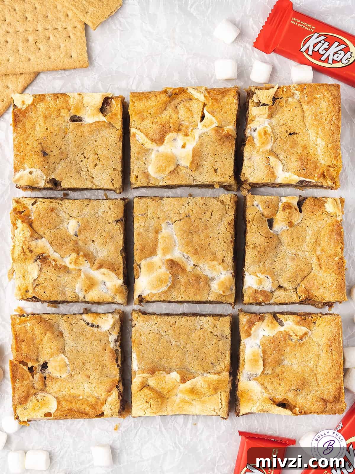 Kit Kat S'mores Bars Recipe — Crispy Chocolate Graham Squares 3 slab of Kit Kat S'mores bars cut into 9 bars