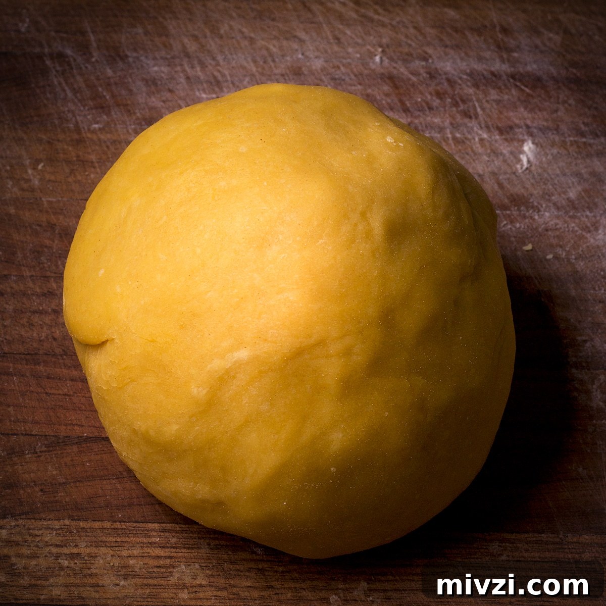 Homemade Pappardelle Recipe: Fresh Pasta from Scratch 10 A ball of homemade pasta dough that's been kneaded until it's smooth.
