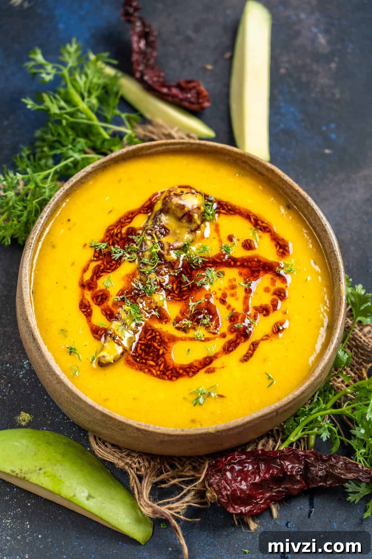 Tangy Raw Mango Dal Recipe for Flavorful Indian Lentils 2 North indian style raw mango dal served in a bowl.