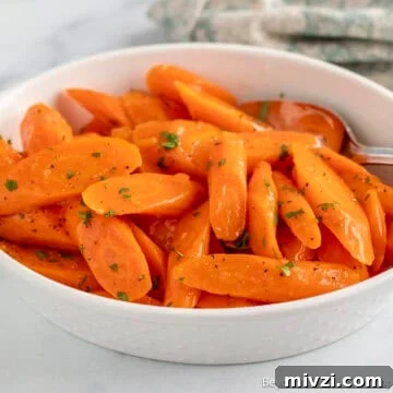 A dish filled with Maple Glazed Carrots.