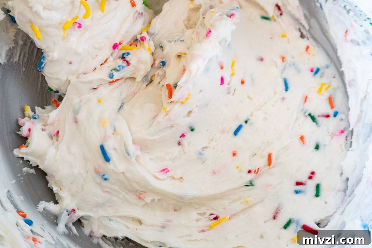 Delicious Birthday Cupcake Recipes for Any Celebration 12 funfettie frosting in bowl.