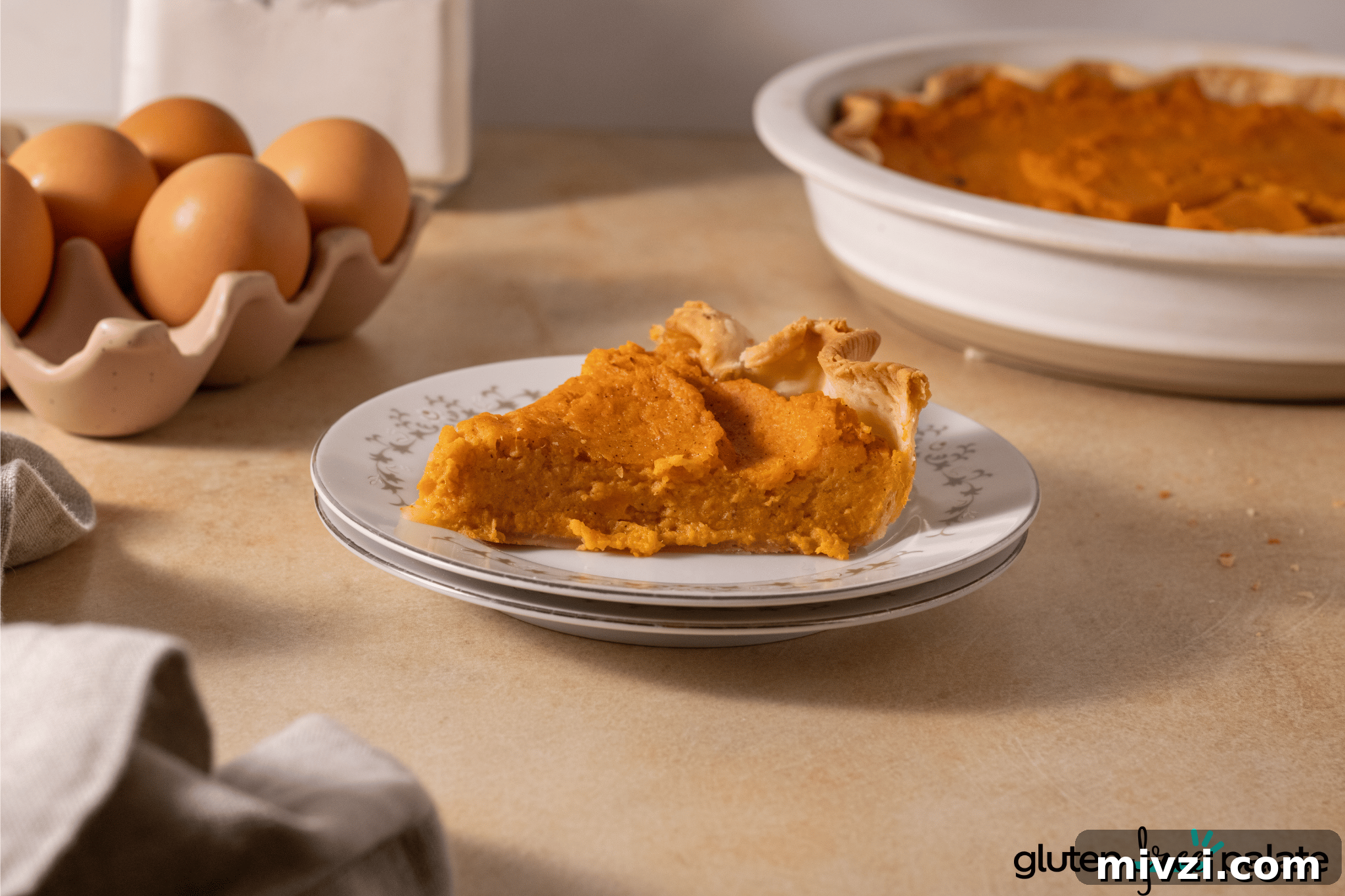 Gluten-Free Sweet Potato Pie Recipe: Simple, Creamy Dessert 4 Gluten-Free Sweet Potato Pie in a white dish